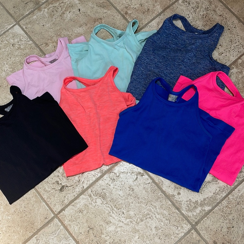 A rainbow of Athleta ribbed stretchy tanks